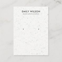 a white book with black dots on it and the title,'emly wilson medical practice