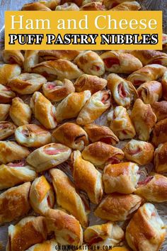 ham and cheese puff pastry nibbles on a baking sheet with text overlay