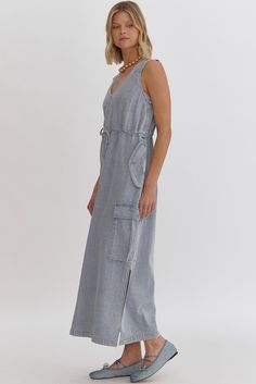 Introducing the ultimate combination of style and functionality - the Shelly Denim Cargo Maxi Dress. This dress is designed to make a statement with its maxi length and cargo pockets, while also providing practicality with a drawstring waist and wide adjustable straps. The ring detail on the back of the straps adds a unique touch to the overall look. This versatile dress is a must-have for all seasons! Denim Dress V-Neck Maxi Length Cargo Pockets Drawstring Waist Wide Adjustable Straps Ring Deta Denim Cargo, Versatile Dresses, High Jeans, Denim Dress, Drawstring Waist, Final Sale, Sweater Cardigan, Adjustable Straps, Overalls