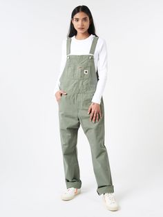 The Women’s Bib Overall Straight takes inspiration from utilitarian garments originally crafted for manual work, but is executed in a contemporary, refined cut. Constructed from a midweight cotton fabric and garment dyed for a more complex colour configuration. Adjustable shoulder straps Utility pockets at the logo patch Carpenter side pockets Button side closures Bartack stitching at vital stress points Materials Fabric Content: 100% cotton Size Guide Hara wears size S. She is 5'6.5"; bust 31"; waist 23"; hips 33.5" XS S M Waist 78 84 90 Front rise 24 25 27 Thigh 32 34 35 Inseam 78 78 78 Fits true to size. We recommend taking your normal size. For additional size information, please visit our size guide or contact Customer Service at mailorder@gravitypope.com Carhartt Overalls Women, Carhartt Overalls, Manual Work, Utility Pockets, Bib Overalls, Overalls Women, Carhartt Wip, Shoulder Straps, Patch Logo