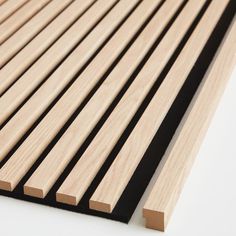 wooden slats are lined up on the floor