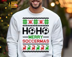 a man wearing a christmas sweater with the words ho ho merry soccer in front of him