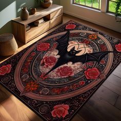 an area rug with a bat and roses on it