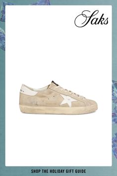 Golden Goose's Super-Star sneakers are crafted of suede and feature a leather star and heel. The lace-up pair is finished with signature scuffing. Round toe Lace-up style Suede/leather upper Leather/textile lining Rubber sole Made in Italy SIZE Platform: about 1 Xmas Wishlist, Star Sneakers, Super Star, Suede Sneakers, Golden Goose, Up Styles, Suede Leather, Apparel Accessories, Rubber Sole