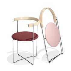 two chairs, one with a circular seat and the other with a curved backrest