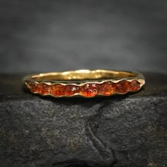 "Raw Citrine Band Ring // Silver Rustic Organic Alternative Rough Raw Uncut Natural Yellow Orange Citrine Crystal Gemstone Wedding Band Ring This listing is for one Citrine band ring. Pictured ring is in 925 sterling silver. DETAILS:  Stone: natural raw Citrine Metal:  - 925 silver  - 925 black silver (will start wearing off immediately, not permanent look) - 14k yellow, rose and white gold (stones appear bit darker in gold) - 18k yellow gold Band Width: approx. 2x1mm, hammered Stone part size: Raw Citrine Ring, Wedding Band Gemstone, Raw Gemstone Ring Silver, Non Diamond Rings, Colorful Wedding Ring, Gemstone Wedding Band, Citrine Wedding, Orange Citrine