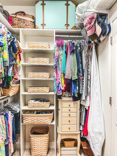 an organized closet with clothes and baskets