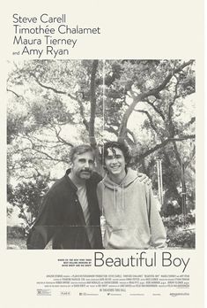 two people standing next to each other in front of a tree with the words beautiful boy on it