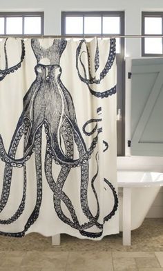 an octopus shower curtain in a bathroom