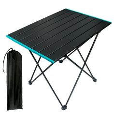 a black and blue folding table next to a bag