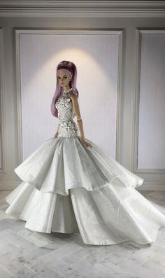 a barbie doll in a white wedding dress