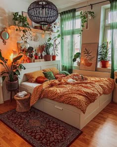 a bed room with a neatly made bed and lots of plants