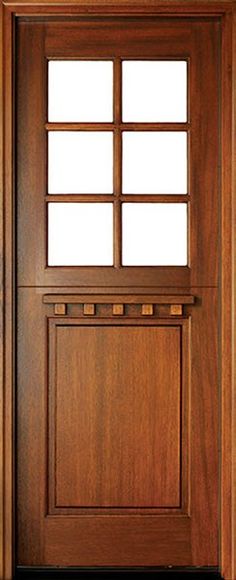 a wooden door with glass on the side