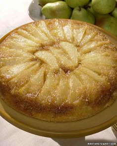 a pineapple upside down cake on a yellow plate