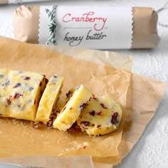 some kind of food on top of a piece of wax paper next to a bag