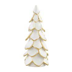 a white ceramic christmas tree with gold trim