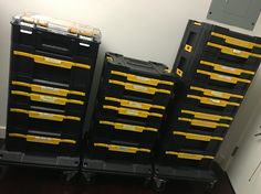 several black and yellow boxes stacked on top of each other