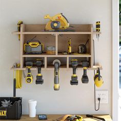 a workbench with tools hanging from it's wall and on the shelf