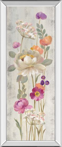 a painting with flowers on it in a white frame