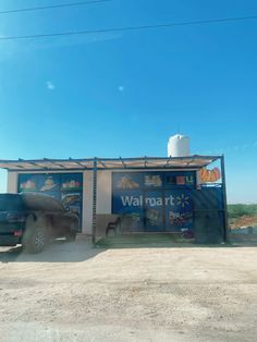 a truck is parked in front of a building