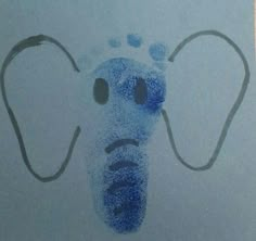 an elephant's foot is drawn in blue ink