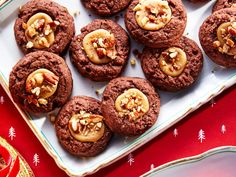 chocolate cookies with walnuts and pecans on a platter