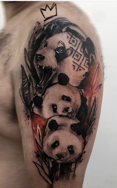 a man's arm with some panda bears on it