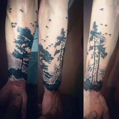 the arm with trees and birds on it