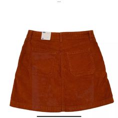 Old Navy Women's Sz 10 Skirt Corduroy Mini Burnt Orange Pockets New With Tags No Flaws Ours Is A Smoke Free Home 189 *See Photos For Approximate Measurements And Fabric Content This Old Navy Women's Skirt Is Perfect For A Casual Occasion. The Burnt Orange Color And Corduroy Fabric Type Give It A Classic Look. The Skirt Is Machine Washable And Has Pockets For Added Convenience. It Is Made Of 67% Cotton, 31% Rayon/Viscose, And 2% Spandex, Making It Comfortable To Wear All Year Round. The Button Cl Casual Corduroy Mini Skirt With Pockets, Casual Corduroy Skirt With Pockets, Casual Corduroy Mini Skirt, Casual Brown Corduroy Mini Skirt, Brown Corduroy Casual Mini Skirt, Casual Brown Corduroy Skirt, Casual Corduroy Skirt, Casual Corduroy Skirt For Spring, Casual Corduroy Mini Skirt For Fall