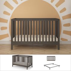 an image of a baby crib in front of a wall with sun decals