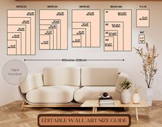 a living room with white couches and tables in front of a wall that has measurements on it