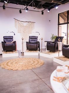 a living room filled with lots of furniture