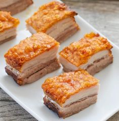 Crispy golden pork belly is a delightful dish that combines rich flavors and satisfying textures. This recipe features tender meat paired with crunchy skin, all without the hassle often associated with gourmet cooking. Infused with Shaoxing rice wine, soy sauce, brown sugar, and garlic, it brings authentic Chinese restaurant vibes right to your kitchen. A salt crust acts as the secret weapon here; it creates an irresistible crunch while enhancing the overall flavor profile of this mouthwatering treat! Salt Pork Recipes, Best Pork Belly Recipe, Pork Belly Recipes Crispy, Mapo Tofu, Salt Pork, Pork Belly Recipes, Crispy Pork Belly, Crispy Pork, Pork Roast