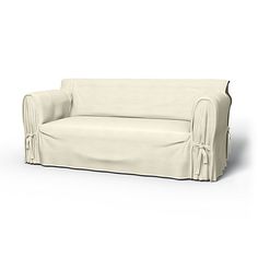 a white couch with a cover on it