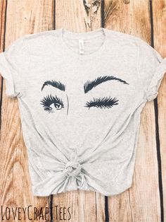 lashes shirt, eyelashes shirt, winking shirt, womens shirt, makeup shirt by LoveyCraftTees on Etsy Lash Shirts, Makeup Shirt, H.e.r Style, Painted Denim, Womens Shirt, Statement Tees, Microblading