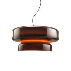 a brown light hanging from a ceiling fixture