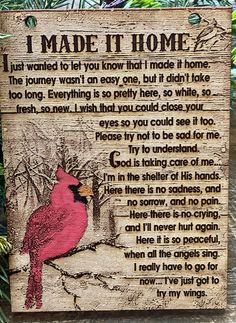 a wooden sign with a cardinal on it that says i made it home, and the poem