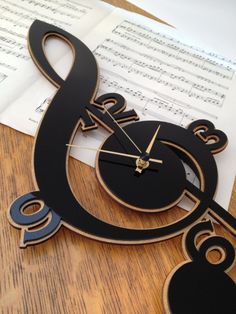 musical notes and treble clefs are featured in this collage