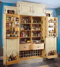 an open cabinet filled with lots of bottles