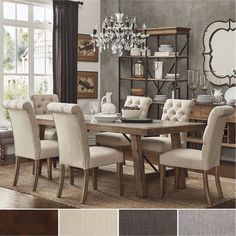 a dining room table with chairs and chandelier in the center, along with several color swatches