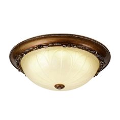 a ceiling light with a white glass shade