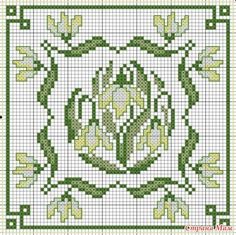 a cross stitch pattern with green and white flowers