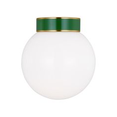 a large white ball with a green top on a white wall mounted light fixture that has a gold rim around it