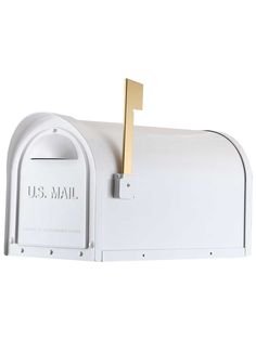 a white mailbox with a yellow stick sticking out of it