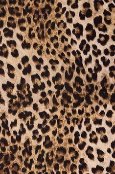 an animal print pattern is shown in brown and black