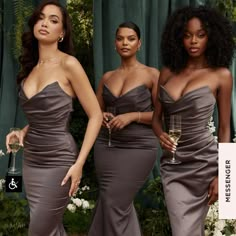 three beautiful women standing next to each other holding wine glasses and posing for the camera