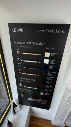 an advertisement for live cook, love on the side of a wall next to a mirror