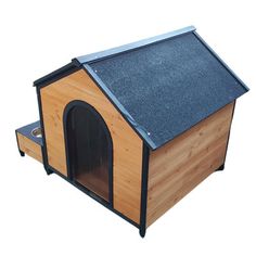 a wooden dog house with a black roof and blue shingles on the top half