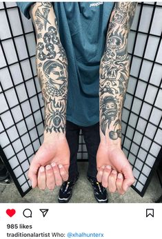 a man with tattoos on his arms and hands