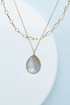 Ethical jewelry: Holly Layered Mother-of-Pearl Necklaces featuring scalloped teardrop pendants. Crafted from 14k gold plated stainless steel and mother-of-pearl. Hypoallergenic. Size: 15-17 inches. Box size and color may vary. Supports ethical initiatives. Starfish Project, Mother Of Pearl Pendant, Mother Of Pearl Necklace, Gold Necklaces, Gold Plated Chains